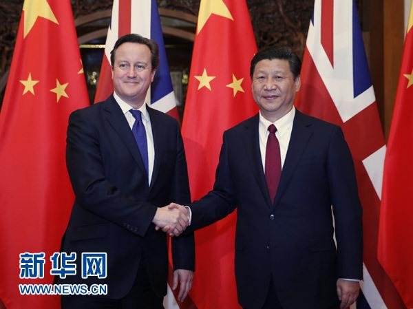12月2日，國家主席習近平在北京釣魚臺國賓館會見英國首相卡梅倫。 新華社記者 鞠鵬 攝